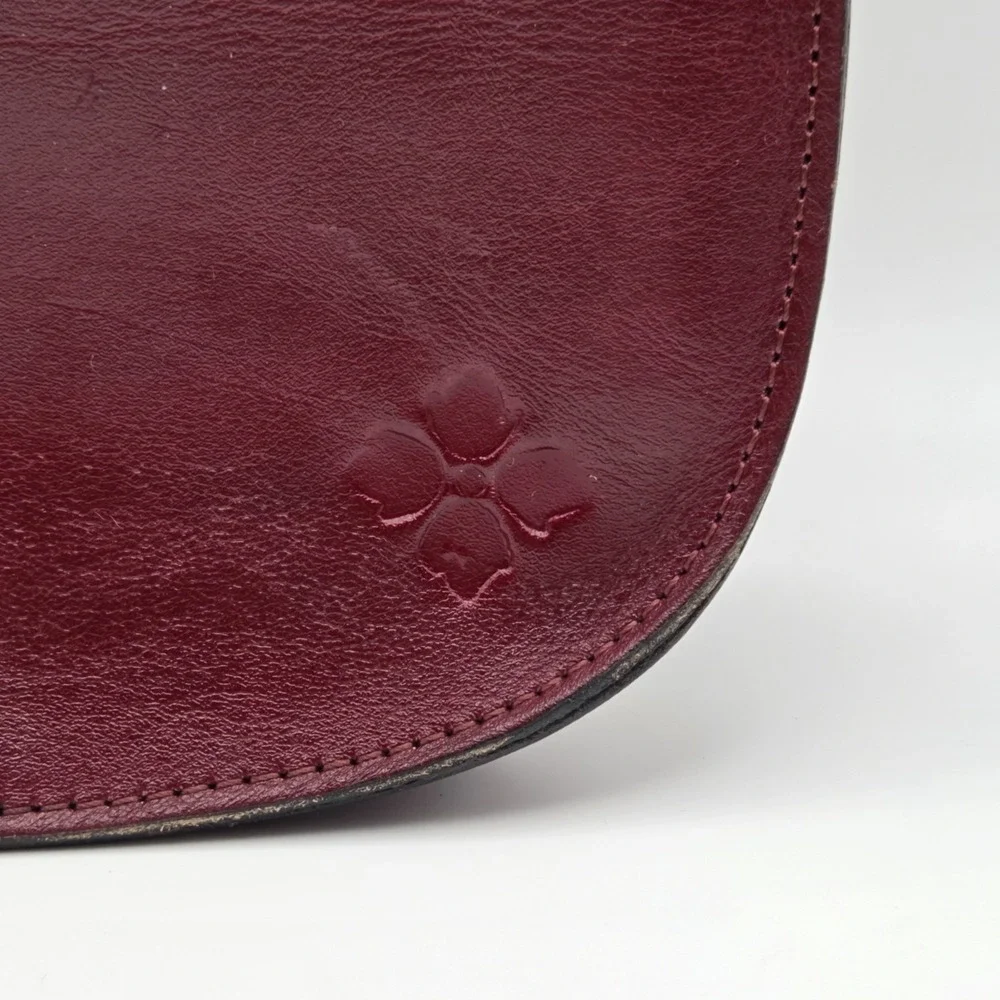Patricia Nash Red Brinlee Saddle Crossbody Rose Tooled Leather Tassel Card Slots